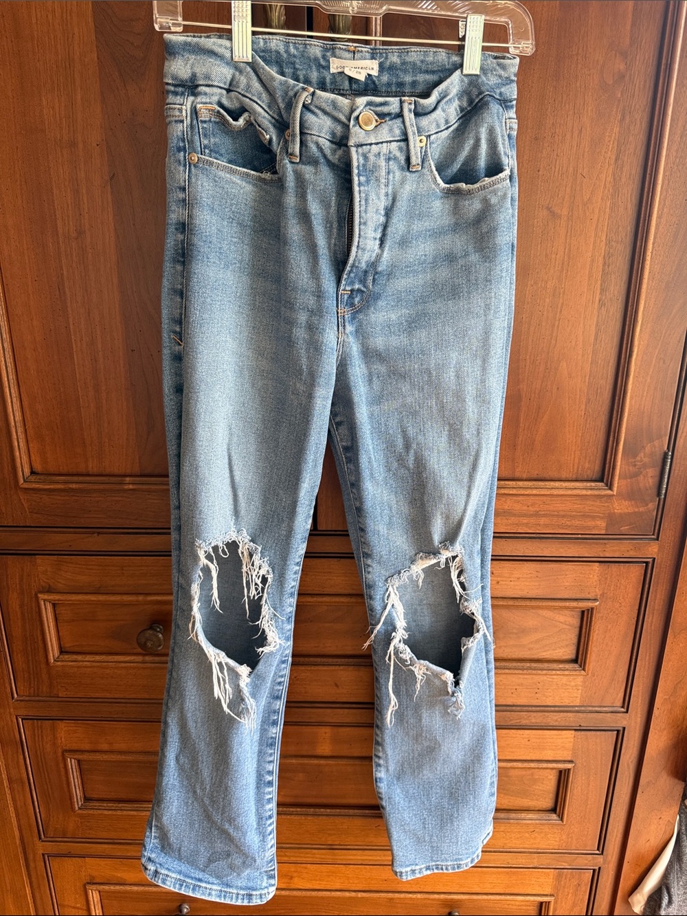 Good American Light Blue Straight Leg Jeans with Knee Rips